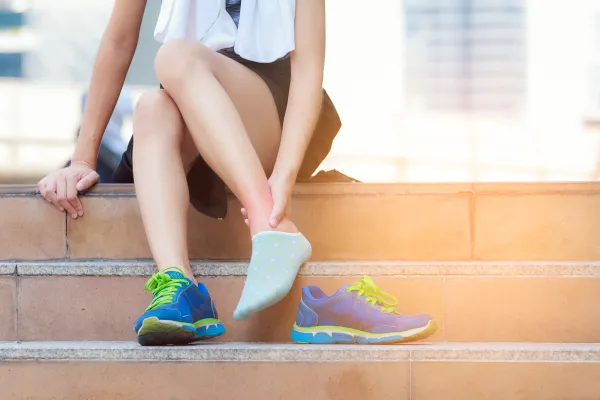 踵骨骨端症などの症状がある女性